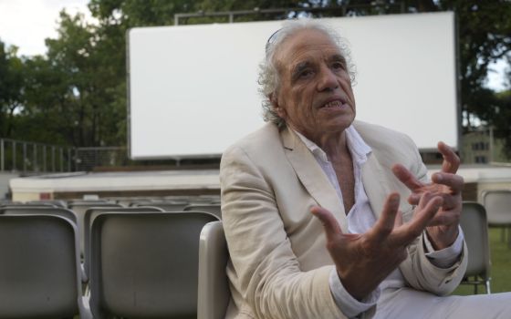 Director Abel Ferrara gestures during an Aug. 23 interview with The Associated Press on his latest movie "Padre Pio" in Rome. (AP/Gregorio Borgia)