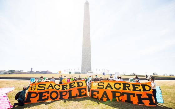 On March 11, people of faith around the world staged hundreds of events, including at the Washington Memorial in Washington, D.C., as part of the "Sacred People, Sacred Earth" day of demonstrations calling on governments and banks to do more to address cl