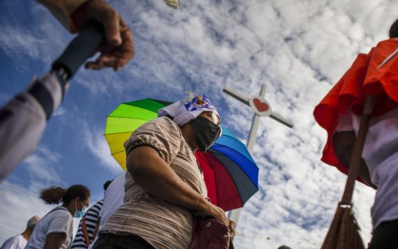 Faithful take part in a procession to the Cathedral Aug. 13 in Managua, Nicaragua. The Catholic Church has called on the faithful to peacefully arrive at the Cathedral in Managua after National Police denied permission for a planned religious procession o