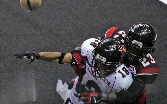 Alphonso Hodge (23) of the Gladiators breaks up a pass to Orlando player Kevin Nickerson (18) during a game at the Arena Football Playoffs at Quicken Loans Arena June 30, 2008 in Cleveland. Nickerson has served as Los Angeles Rams chaplain since 2016. 