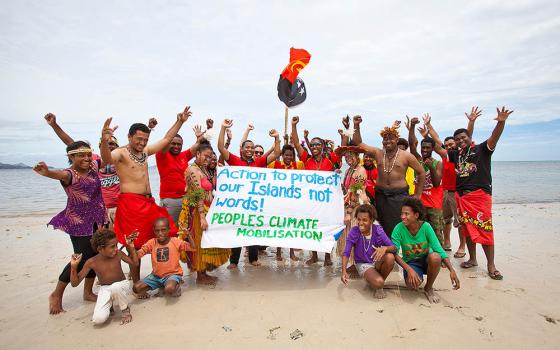 Members of the Pacific Climate Warriors in Papua New Guinea pose during an event. (Courtesy of Pacific Climate Warriors)