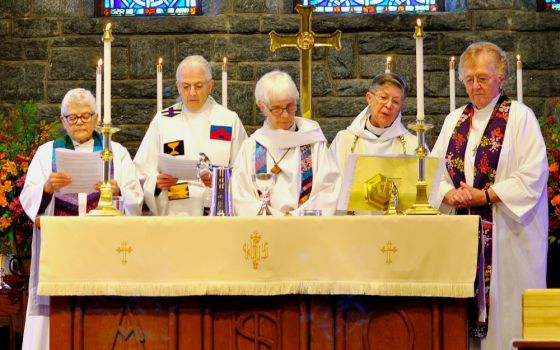 From left: Merrill Bittner, Emily Hewitt, Carter Heyward, Nancy Wittig and Marie Moorefield Fleischer preside at a memorial service for Alison Cheek Nov. 2 at St. Philip’s Episcopal Church in Brevard, North Carolina. (Darlene O’Dell)