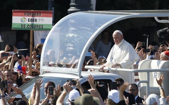 Pope Francis greets the crowd before celebrating the closing Mass of the International Eucharistic Congress at Heroes' Square in Budapest, Hungary, Sept. 12, 2021.