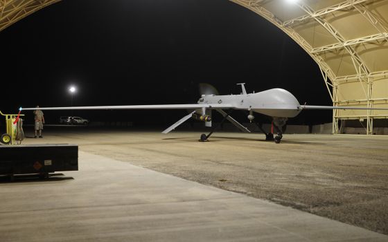 An MQ-1 Predator drone prepares to launch for a night flight mission over southeastern Iraq in July 2009. (Wikimedia Commons/U.S. Air Force/Airman 1st Class Tony Ritter)