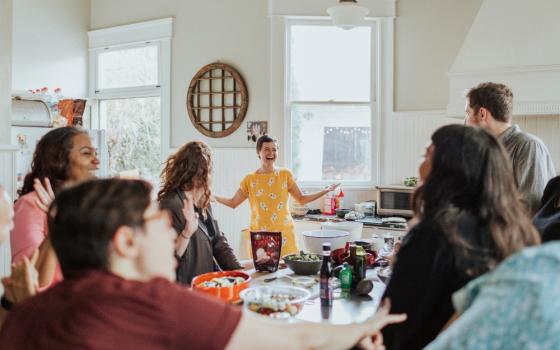 A potluck gathering organized by the Dinner Party, a nonprofit that recruits hosts who bring young people together to talk about grief (Courtesy of the Dinner Party)