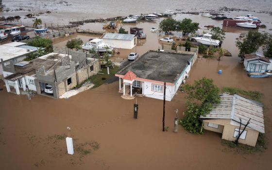 Buildings are flooded on Salinas Beach after the passing of Hurricane Fiona in Salinas, Puerto Rico, Sept. 19, 2022. (AP Photo/Alejandro Granadillo)