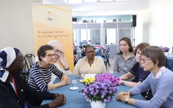 Women who attended the gathering in Frascati outside of Rome are pictured in a Vatican synod video. From left: Sr. Anne-Béatrice Faye; Susan Pascoe; Philomena Njeri Mwaura; Maike Sieben; Sr. Gill Goulding, and Sr. Brigit Weiler. (NCR screenshot/YouTube/Sy