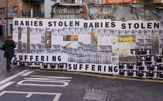 Street art in Dublin in 2013 protests Ireland's system of adopting the babies of unmarried mothers from mother and baby homes, which were often run by Catholic nuns. (Flickr/William Murphy)