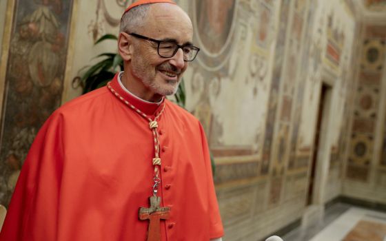 Cardinal Michael Czerny poses for photographers prior to meeting relatives and friends after he was elevated to cardinal by Pope Francis, at the Vatican, Oct. 5, 2019. (AP Photo/Andrew Medichini, File)
