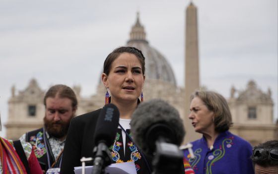 President of the Metis community, Cassidy Caron, speaks to the media in St. Peter's Square after their meeting with Pope Francis at The Vatican, Monday, March 28, 2022. (AP Photo/Gregorio Borgia)