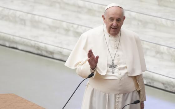 Pope Francis arrives at the opening of a 3-day Symposium on Vocations in the Paul VI hall at the Vatican, Thursday, Feb. 17, 2022. (AP Photo/Gregorio Borgia)