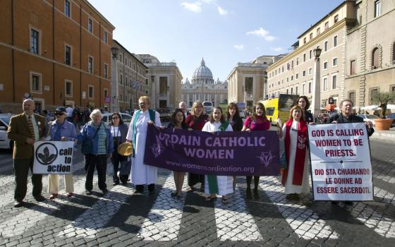 Members of the Women's Ordination Conference group stage a protest in front of St. Peter's Basilica, in Rome, on Oct. 17, 2011. (AP Photo/Andrew Medichini, File)