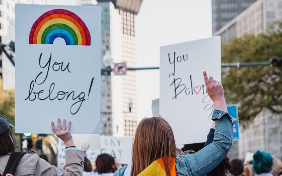 "You belong!" LGBT signs (Unsplash/Aiden Craver)