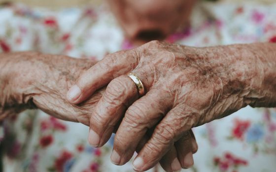 Elderly woman's hands (Unsplash/Eduardo Barrios)