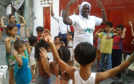 Sisters of Our Lady of the Immaculate Conception of Castres work with children from depressed areas at Emilie's Home in Quezon City, Philippines, in 2014. (Provided photo)