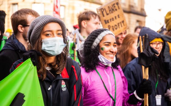 Young women from London join a protest during a Day of Action at the U.N. Climate Change Conference Nov. 6 in Glasgow, Scotland. (CNS/Courtesy of  CAFOD/Louise Norton)