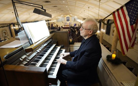 James Kendall plays the organ during an "Advent Lessons and Carols" service on the first Sunday of Advent Nov. 28 at Our Lady of Perpetual Help Church in Lindenhurst, New York. (CNS/Gregory A. Shemitz)