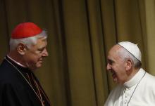 Cardinal Gerhard Müller, then-prefect of the Congregation for the Doctrine of the Faith, greets Pope Francis before the morning session of the extraordinary Synod of Bishops on the family Oct. 13, 2014, at the Vatican. (CNS/Paul Haring)