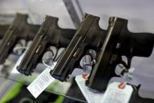 Handguns are seen for sale in a display case at Metro Shooting Supplies in Bridgeton, Missouri. (CNS/Reuters/Jim Young)