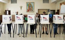 Voters mark their ballots at Assumption Catholic Church in Los Angeles during the midterm elections Nov. 6. (CNS/EPA/Mike Nelson)