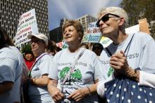 Sr. Helen Kearney, center, president of the Sisters of St. Joseph of Brentwood, New York, and St. Joseph Sr. Mary Doyle, right, participate in the Global Climate Strike in New York City Sept. 20, 2019. (CNS/Gregory A. Shemitz)