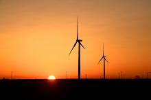 Wind turbines operate at sunrise in the Permian Basin oil and natural gas production area in Big Spring, Texas, Feb. 12, 2019. (CNS photo/Nick Oxford, Reuters)