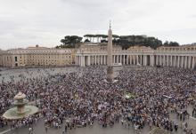 People attend the Angelus led by Pope Francis from the window of his studio overlooking St. Peter's Square at the Vatican Oct. 4. (CNS/Vatican Media)