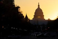 The sun rises over the U.S. Capitol Nov. 9 in Washington, the day after Election Day. (CNS/Reuters/Tom Brenner)