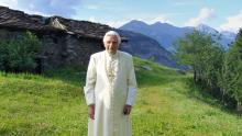 Pope Benedict XVI poses in Alpeggio Pileo near his summer residence in Les Combes, in the Valle d'Aosta in northern Italy July 14, 2005. Pope Benedict died Dec. 31, 2022, at the age of 95 in his residence at the Vatican. 