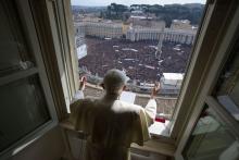 Pope Benedict XVI leads his last public Angelus from the window of his apartment overlooking St. Peter's Square at the Vatican Feb. 24, 2013.