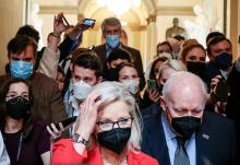 Rep. Liz Cheney, R-Wyo., and her father, former Vice President Dick Cheney, are pursued by reporters after attending a moment of silence event on Capitol Hill Jan. 6 in Washington, the first anniversary of the attack on the U.S. Capitol. (CNS)