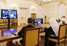 Russian Orthodox Patriarch Kirill of Moscow and Metropolitan Hilarion of Volokolamsk, head of external relations for the Russian Orthodox Church, participate in a video meeting with Pope Francis and Swiss Cardinal Kurt Koch