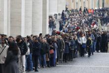 People wait in line to enter St. Peter's Basilica to view the body of Pope Benedict XVI at the Vatican Jan. 2, 2023. (CNS photo/Paul Haring)
