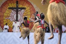 Pope Francis, second from left, watches traditional dancers perform at the Martyrs' Stadium in Kinshasa, Democratic Republic of the Congo Feb. 2. (AP/Gregorio Borgia)