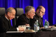 Archbishop Timothy P. Broglio (center) of the U.S. Archdiocese for the Military Services, who is president of the U.S. Conference of Catholic Bishops, speaks June 15 during the bishops' spring plenary assembly in Orlando, Fla. Also pictured are Archbishop William E. Lori of Baltimore, USCCB vice president (left), and Fr. Michael J.K. Fuller, USCCB general secretary. (OSV News /Bob Roller)