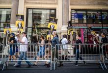 SAG-AFTRA members picket in front of Warner Bros.' offices in Manhattan, New York, on July 31. (Wikimedia Commons/Phil Roeder)