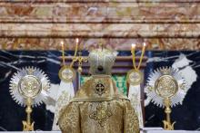 Melkite Catholic Patriarch Joseph Absi stands at the Altar of the Chair in St. Peter's Basilica for the celebration of a Byzantine Divine Liturgy as part of the assembly of the Synod of Bishops at the Vatican Oct. 9. (CNS/Lola Gomez)