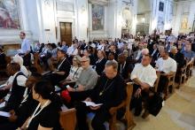 Participants in the assembly of the Synod of Bishops arrive to pray in Rome's Basilica of St. Sebastian as part of their pilgrimage to Rome's ancient catacombs Oct. 12. (CNS/Lola Gomez)