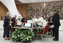 Pope Francis gives his blessing at the conclusion of the assembly of the Synod of Bishops' last working session Oct. 28 in the Paul VI Hall at the Vatican. (CNS/Vatican Media)