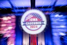 Signage for the 2024 Iowa caucuses is seen taken with a long exposure at the Iowa Caucus Media Center located within the Iowa Events Center in Des Moines Jan. 14. (OSV News/Reuters/Cheney Orr)