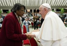 Pope Francis greets Cynthia Bailey Manns, a synod member and director of adult learning at St. Joan of Arc Parish in Minneapolis, before a session of the assembly of the Synod of Bishops Oct. 17, 2023, at the Vatican. (CNS/Vatican Media)