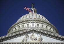 A file photo shows the American flag below the U.S. Capitol dome in Washington. (OSV News/Reuters/Jonathan Ernst)