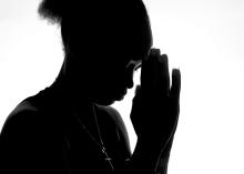 Silhouette of a person praying (Unsplash/Adegbenro Emmanuel Dipo)