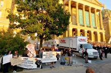 The Occupy the World Food Prize group protests within sight and sound of the Iowa Capitol building during the presentation of the World Food Prize on Oct. 19 in Des Moines. (Aaron Jorgensen-Briggs)