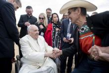 Pope Francis and Chief Wilton Littlechild say farewell July 29 in Iqaluit, Nunavut, as the pope prepares to return to the Vatican after a six-day visit to Canada. 