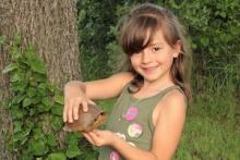 little girl with turtle