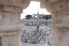 Pilgrims and visitors gather in St. Peter's Square at the Vatican to pray the Angelus with Pope Francis Sept. 20. (CNS/Vatican Media)