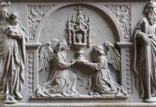 Eucharistic adoration is depicted in relief on a 1624 baptismal font at the Jesuit Church in Molsheim, France. (Wikimedia Commons/©Ralph Hammann)