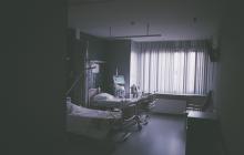A darkened, empty hospital room
