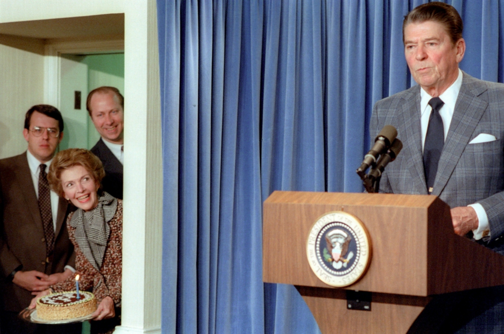 President Ronald Reagan speaks at a press briefing Feb. 4, 1983, when a surprise party was held in honor of his 71st birthday. (CNN Press Room)